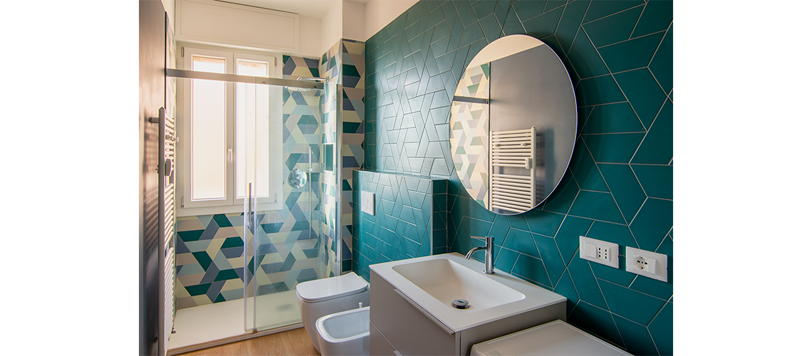 progettazione personalizzata di interni, interior design per un appartamento ad uso residenziale a Bologna, piastrelle con giochi di forme e colori